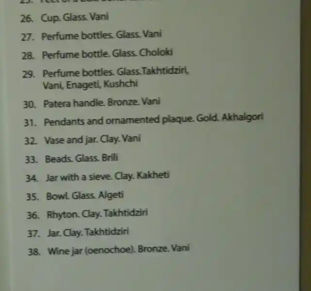 Patera handle - A man with horns holding wings on his head